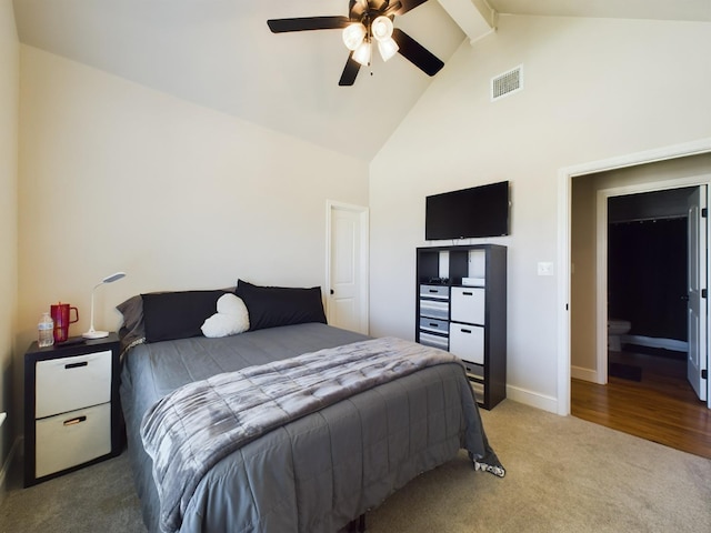 bedroom with ceiling fan, high vaulted ceiling, carpet floors, visible vents, and baseboards