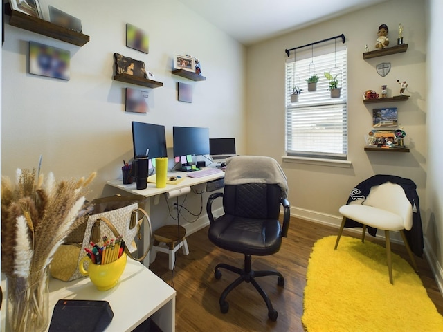 home office featuring baseboards and dark wood-style flooring