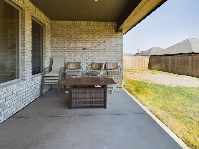 view of patio / terrace with fence