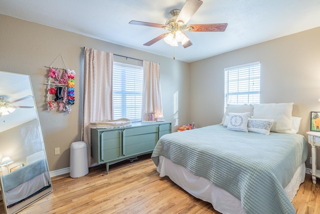 bedroom featuring ceiling fan and light wood-type flooring