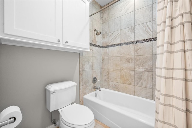 bathroom featuring toilet and shower / bath combo