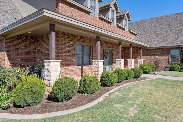 view of property exterior with a lawn and a porch