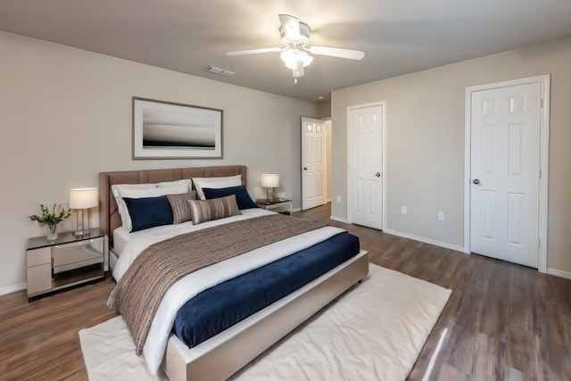 bedroom featuring dark wood-type flooring and ceiling fan