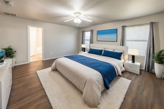 bedroom featuring ceiling fan and dark hardwood / wood-style floors