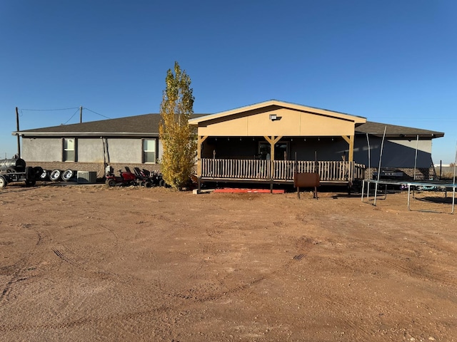 manufactured / mobile home featuring a trampoline