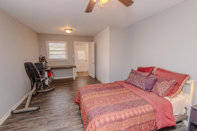 bedroom featuring dark hardwood / wood-style floors and ceiling fan