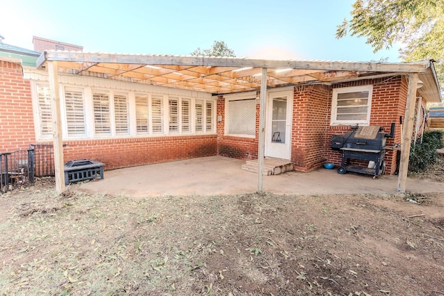 rear view of house featuring a patio area