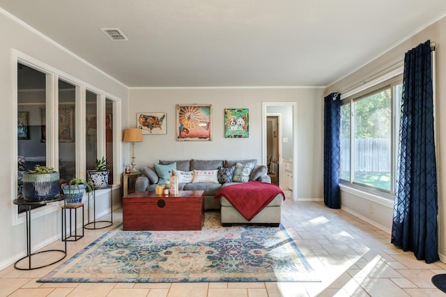 tiled living room with crown molding