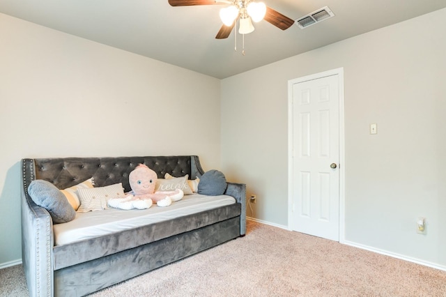 sitting room featuring carpet flooring and ceiling fan