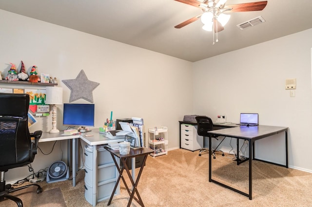 office area featuring ceiling fan and light colored carpet