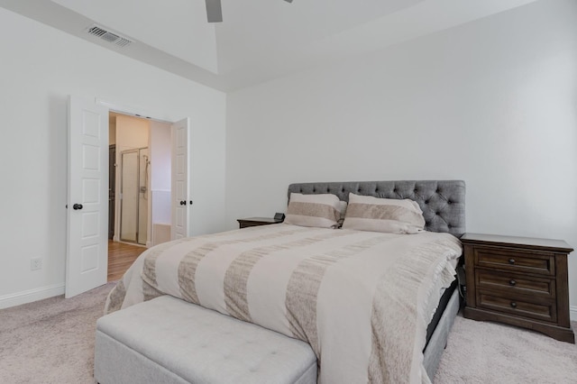 bedroom with light carpet and ceiling fan