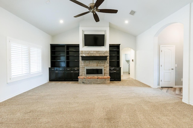 208 Berkshire Ave, Wolfforth, TX 79382 - unfurnished living room featuring ceiling fan, visible vents, arched walkways, baseboards, and carpet flooring