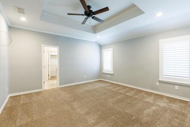 208 Berkshire Ave, Wolfforth, TX 79382 - carpeted spare room featuring baseboards, ornamental molding, and a tray ceiling