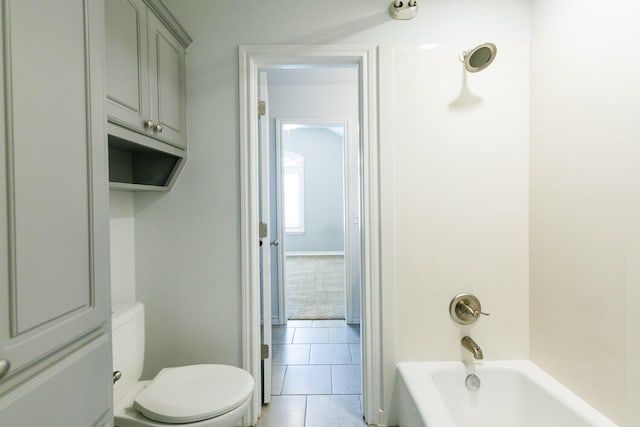 208 Berkshire Ave, Wolfforth, TX 79382 - bathroom featuring tile patterned flooring, toilet, and shower / washtub combination