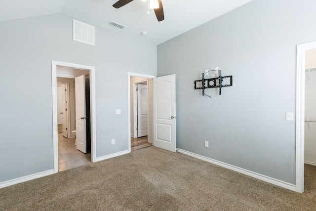 208 Berkshire Ave, Wolfforth, TX 79382 - unfurnished bedroom with visible vents, carpet, a walk in closet, and baseboards