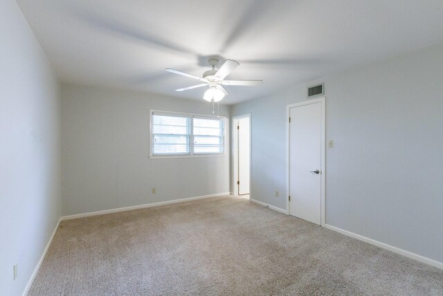 5418 15th St, Lubbock, TX 79416 - spare room featuring a ceiling fan and carpet
