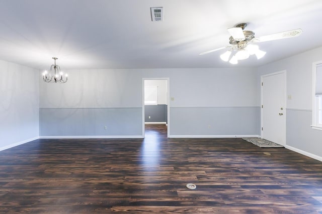 5418 15th St, Lubbock, TX 79416 - spare room featuring a chandelier, wood finished floors, and a ceiling fan