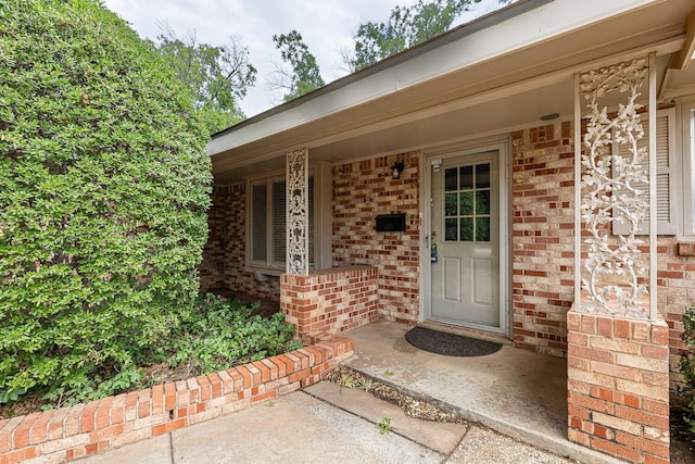 5418 15th St, Lubbock, TX 79416 - entrance to property featuring brick siding and covered porch
