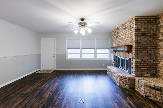 5418 15th St, Lubbock, TX 79416 - unfurnished living room with ceiling fan, a fireplace, and wood finished floors