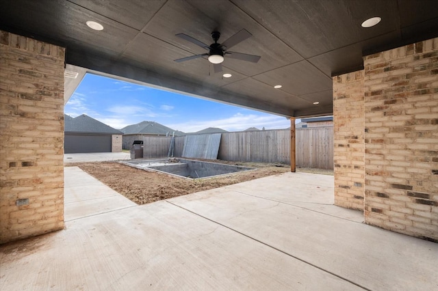 view of patio with ceiling fan