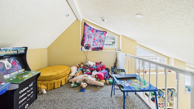 4615 94th St, Lubbock, TX 79424 - rec room featuring a textured ceiling and carpet