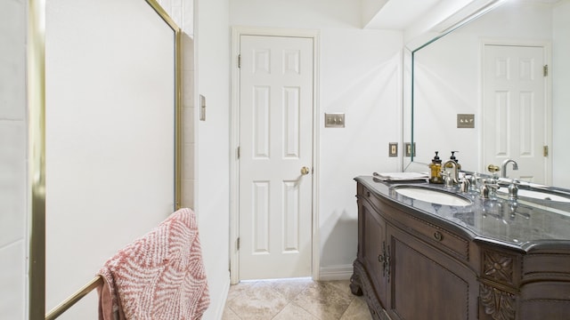 4615 94th St, Lubbock, TX 79424 - bathroom featuring vanity, tile patterned flooring, and baseboards