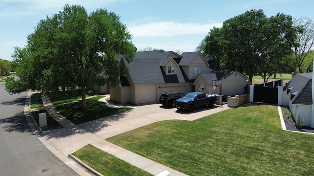4615 94th St, Lubbock, TX 79424 - view of front of house featuring concrete driveway, a garage, and a shingled roof