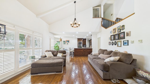 4615 94th St, Lubbock, TX 79424 - living room with high vaulted ceiling, hardwood / wood-style floors, a chandelier, and beamed ceiling