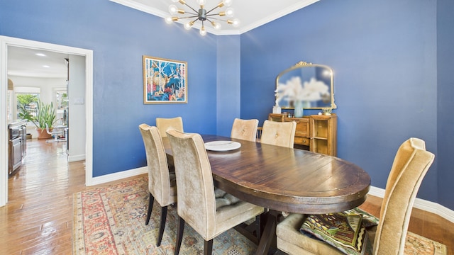 4615 94th St, Lubbock, TX 79424 - dining room featuring baseboards, a chandelier, wood finished floors, and ornamental molding