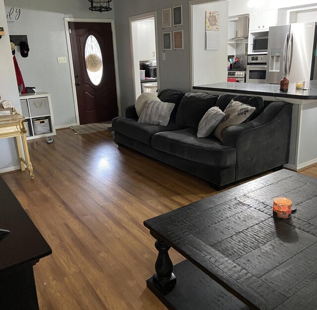 living room with hardwood / wood-style flooring