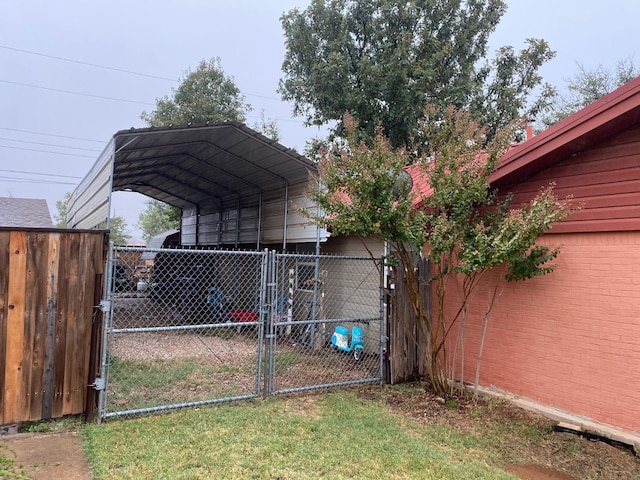 view of yard with a carport
