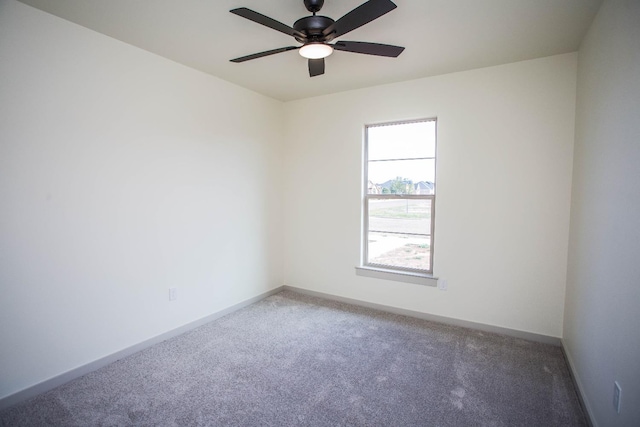 unfurnished room with carpet floors and ceiling fan