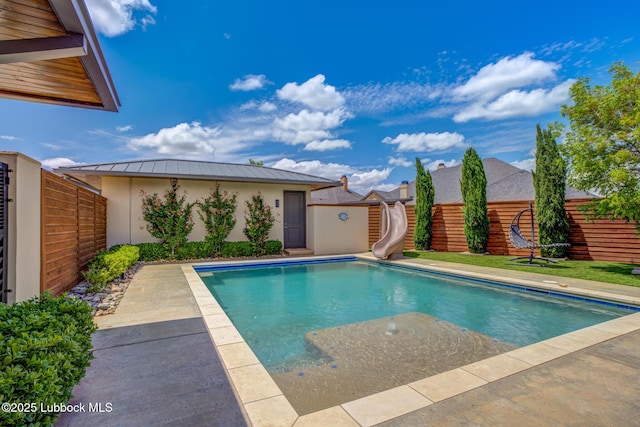 11604 Uxbridge Ave, Lubbock, TX 79424 - view of swimming pool featuring a water slide