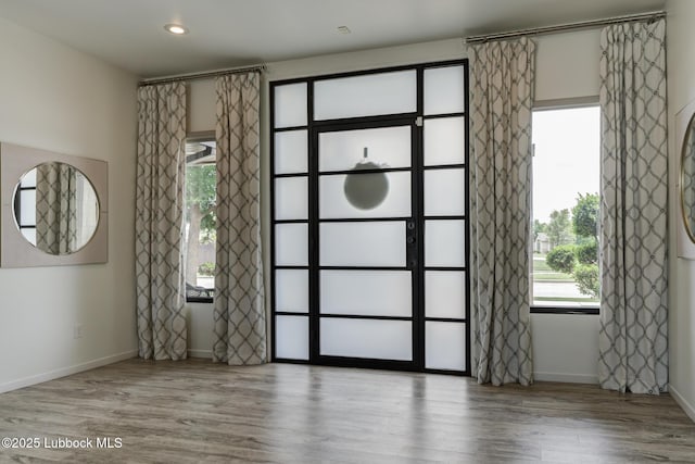 11604 Uxbridge Ave, Lubbock, TX 79424 - empty room with wood finished floors and baseboards