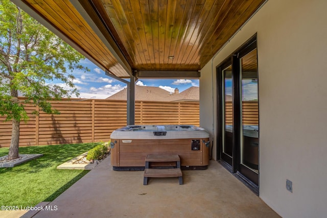 11604 Uxbridge Ave, Lubbock, TX 79424 - view of patio with a hot tub