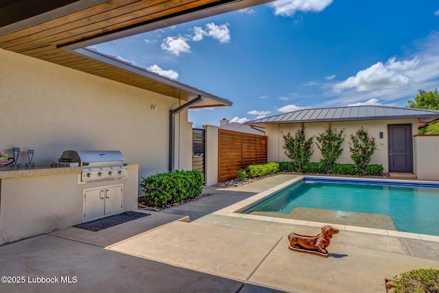 11604 Uxbridge Ave, Lubbock, TX 79424 - swimming pool with an outdoor kitchen and a patio