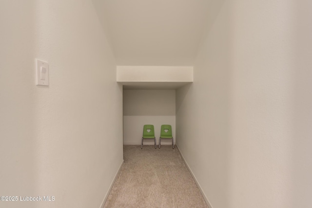11604 Uxbridge Ave, Lubbock, TX 79424 - corridor featuring light carpet and baseboards