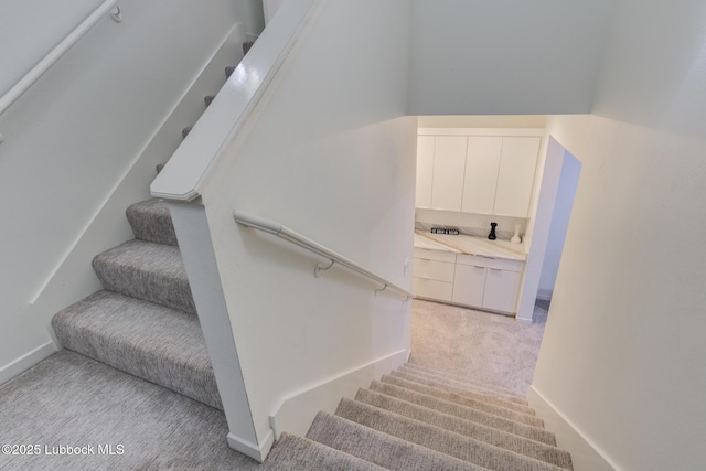 11604 Uxbridge Ave, Lubbock, TX 79424 - stairs with carpet and baseboards