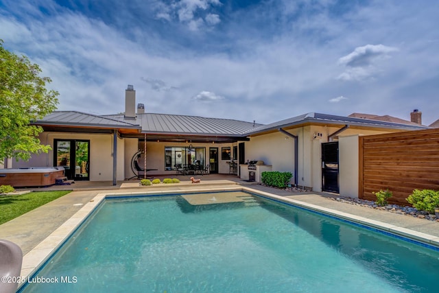 11604 Uxbridge Ave, Lubbock, TX 79424 - swimming pool featuring a hot tub and a patio