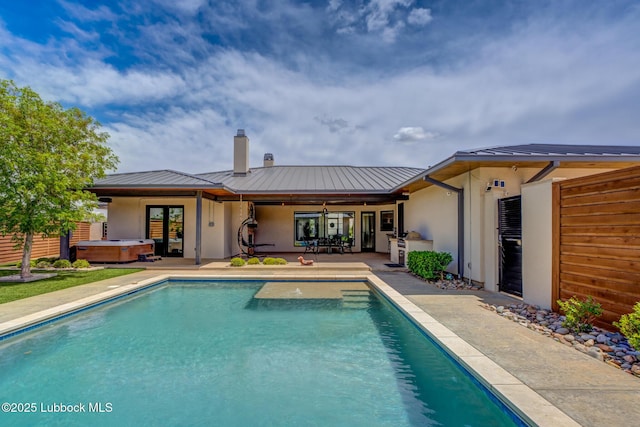 11604 Uxbridge Ave, Lubbock, TX 79424 - outdoor pool featuring a hot tub, a patio area, and french doors