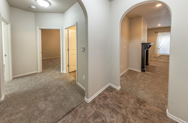 full bathroom with tiled shower / bath combo, vanity, and toilet