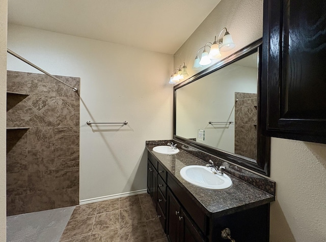 bathroom with vanity and tile patterned floors