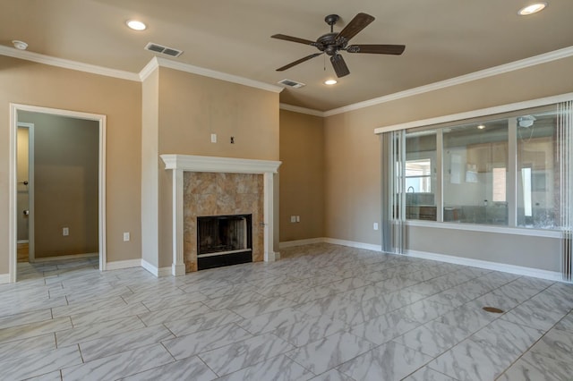 unfurnished living room featuring ceiling fan, ornamental molding, and a tile fireplace