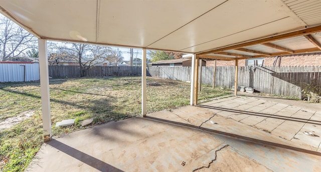 view of patio / terrace with a storage unit