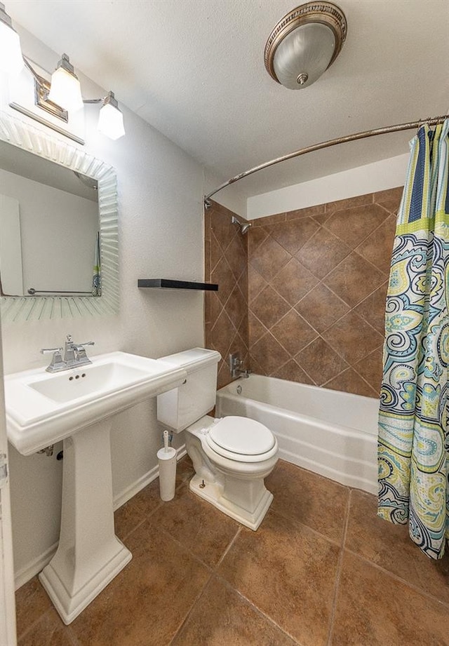 bathroom featuring tile patterned flooring, toilet, and shower / bath combo