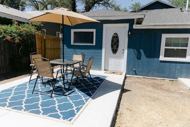 property entrance with a patio