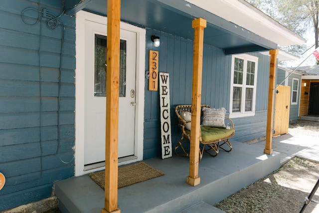 entrance to property with a porch