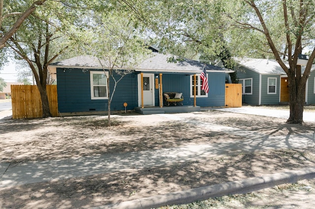 ranch-style home with covered porch