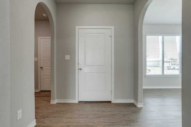 hall with light wood-type flooring