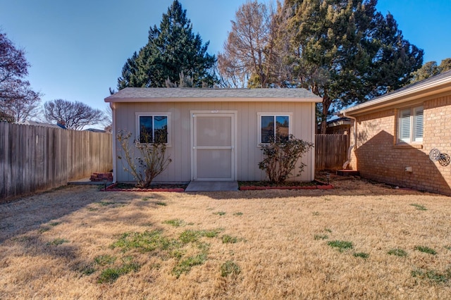 view of outdoor structure featuring a yard